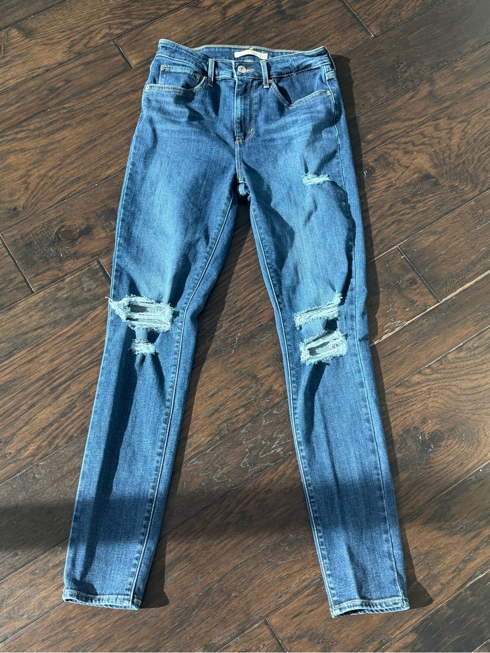 Levi’s 721 high rise skinny jeans with holes size 27